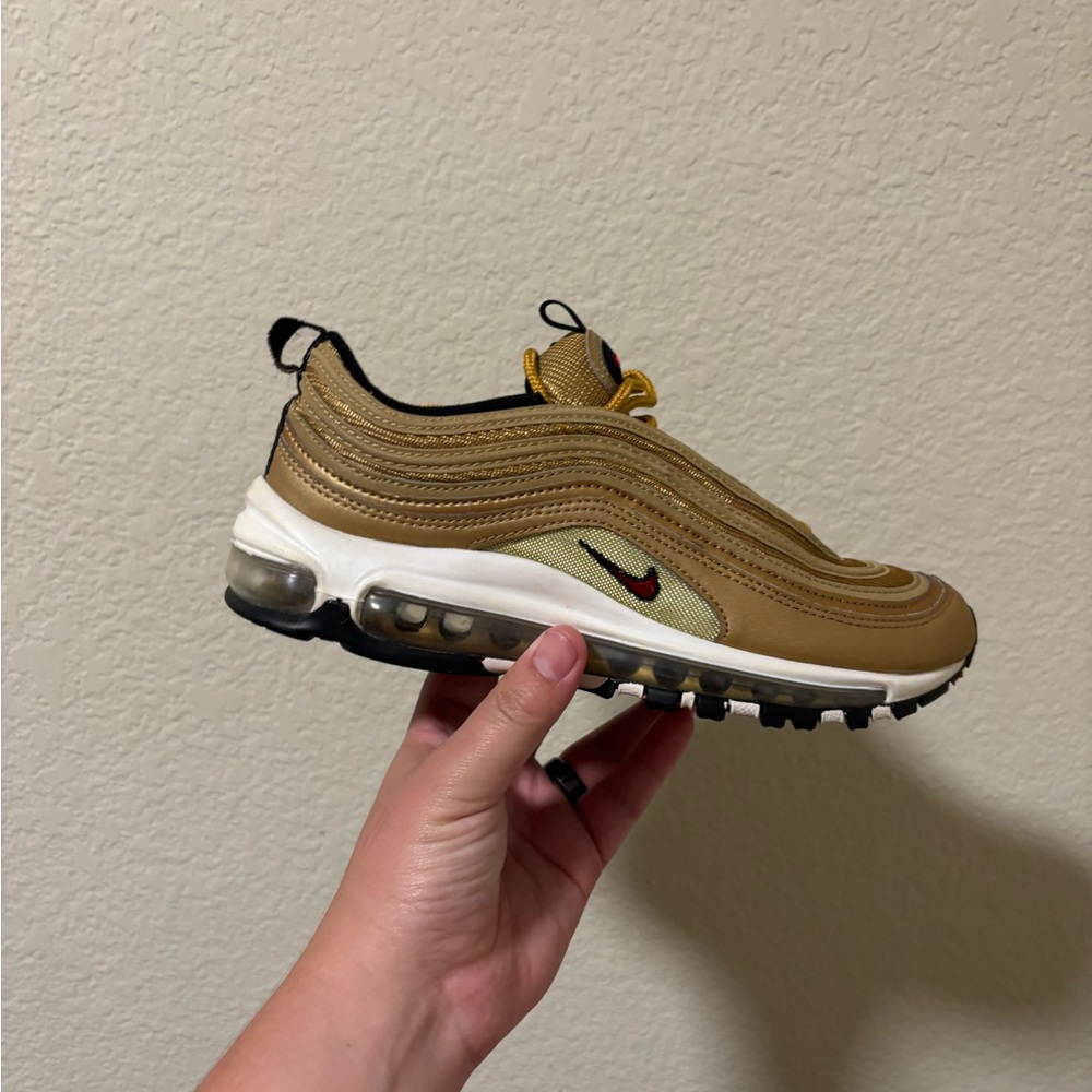 Nike Women's Shoes in Gold and Black